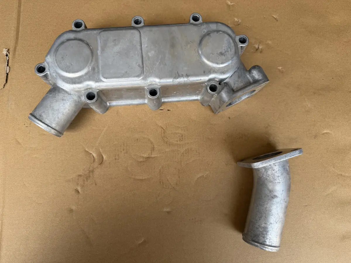 Doosan DE08TIS engine oil cooler cover/Daewoo bus truck excavator parts 65.05605-0028